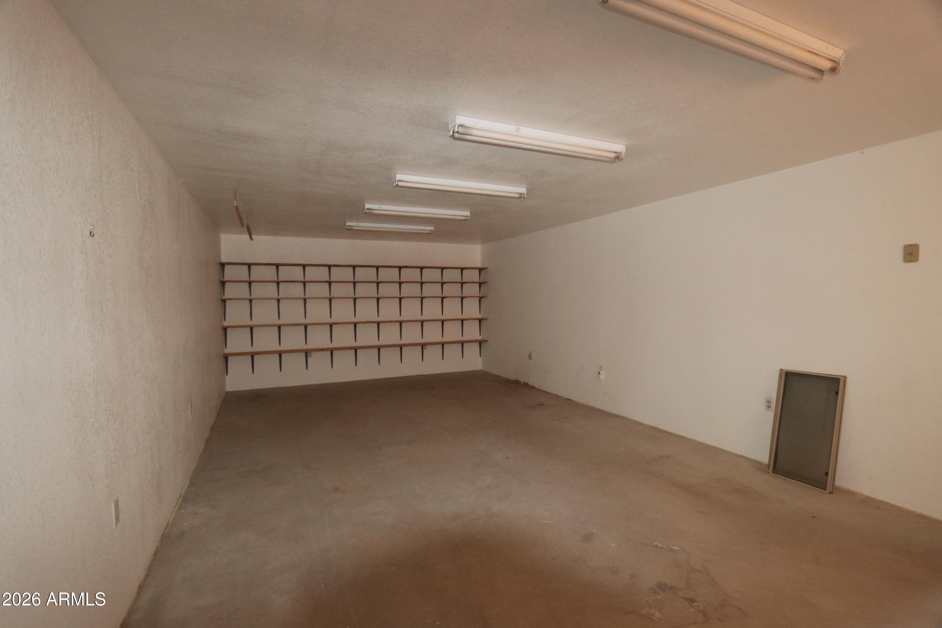 6286 East Mockingbird Road, Unit 8 Pearce, AZ 85625 - Photo 5 of 28 a view of a garage