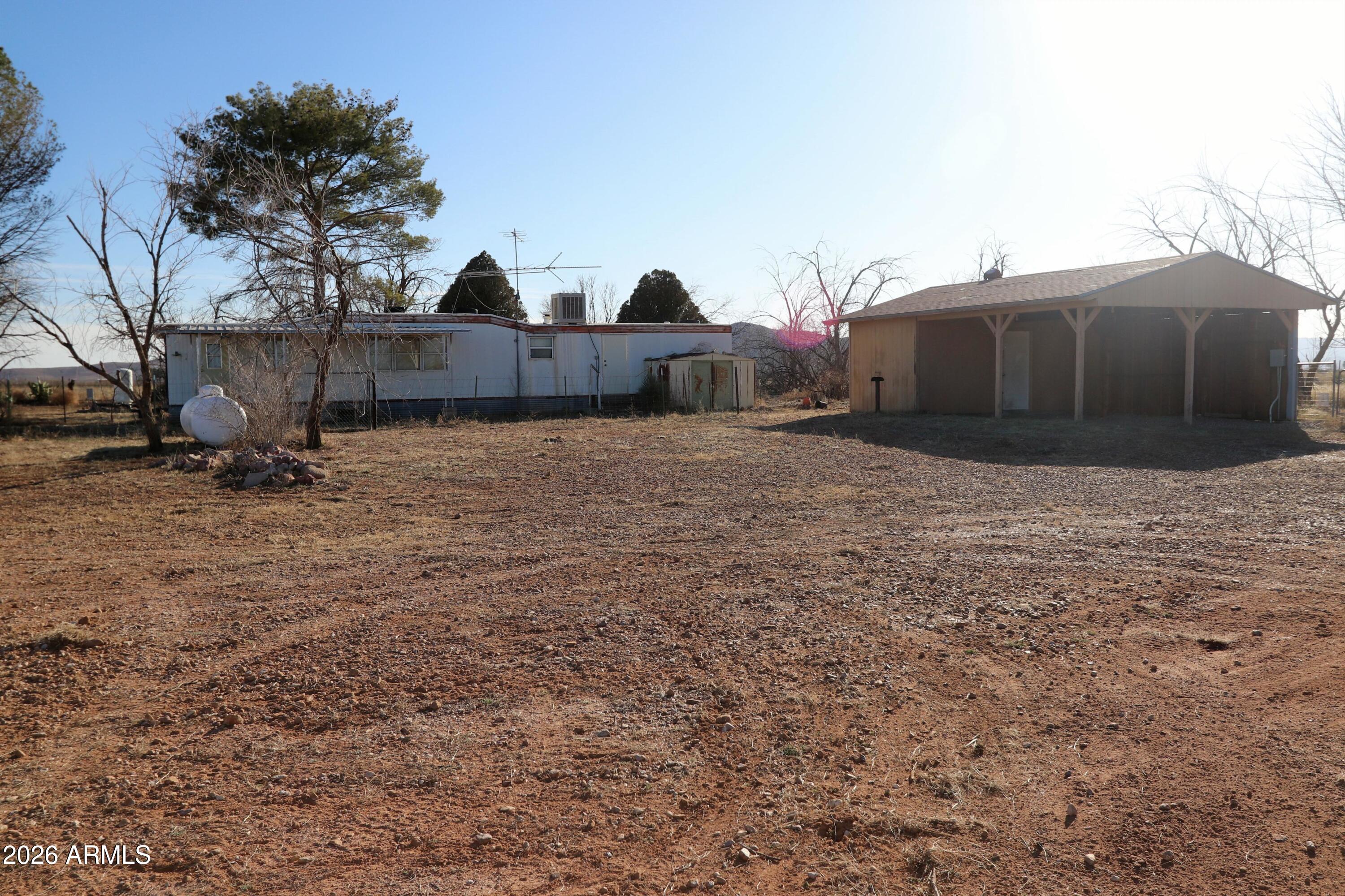 6286 East Mockingbird Road, Unit 8 Pearce, AZ 85625 - Photo 10 of 28 a backyard of a house