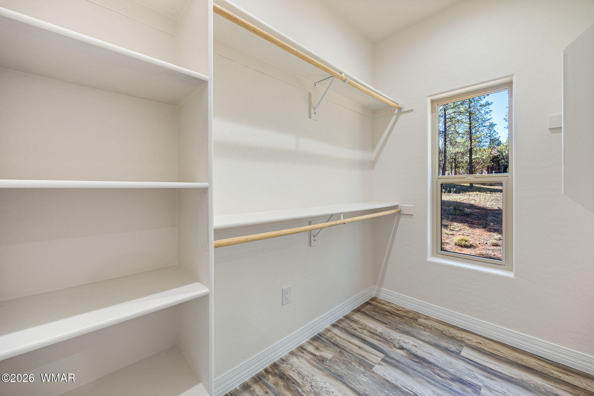 2273 Constellation Lane Overgaard, AZ 85933 - Photo 18 of 31 a view of an empty walk in closet