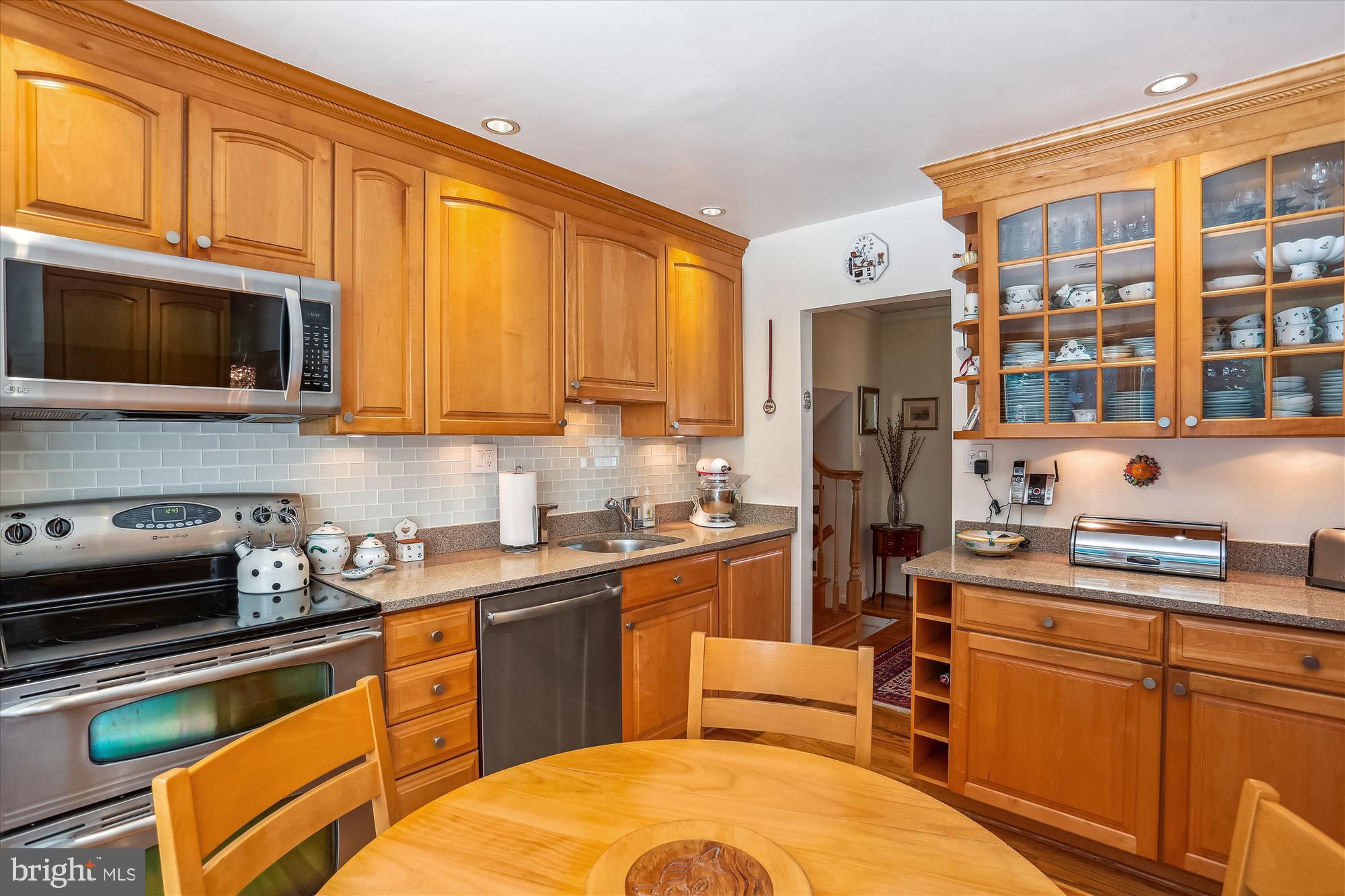 4010 Delancy Drive Silver Spring, MD 20906 - Photo 17 of 63 Kitchen with glass backsplash & Silestone Counters