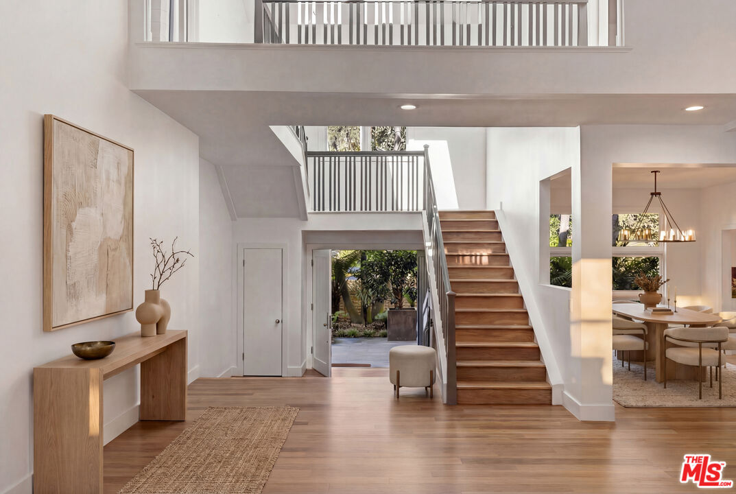 576 East Channel Road Santa Monica, CA 90402 - Photo 5 of 22 a view of an entryway with wooden floor
