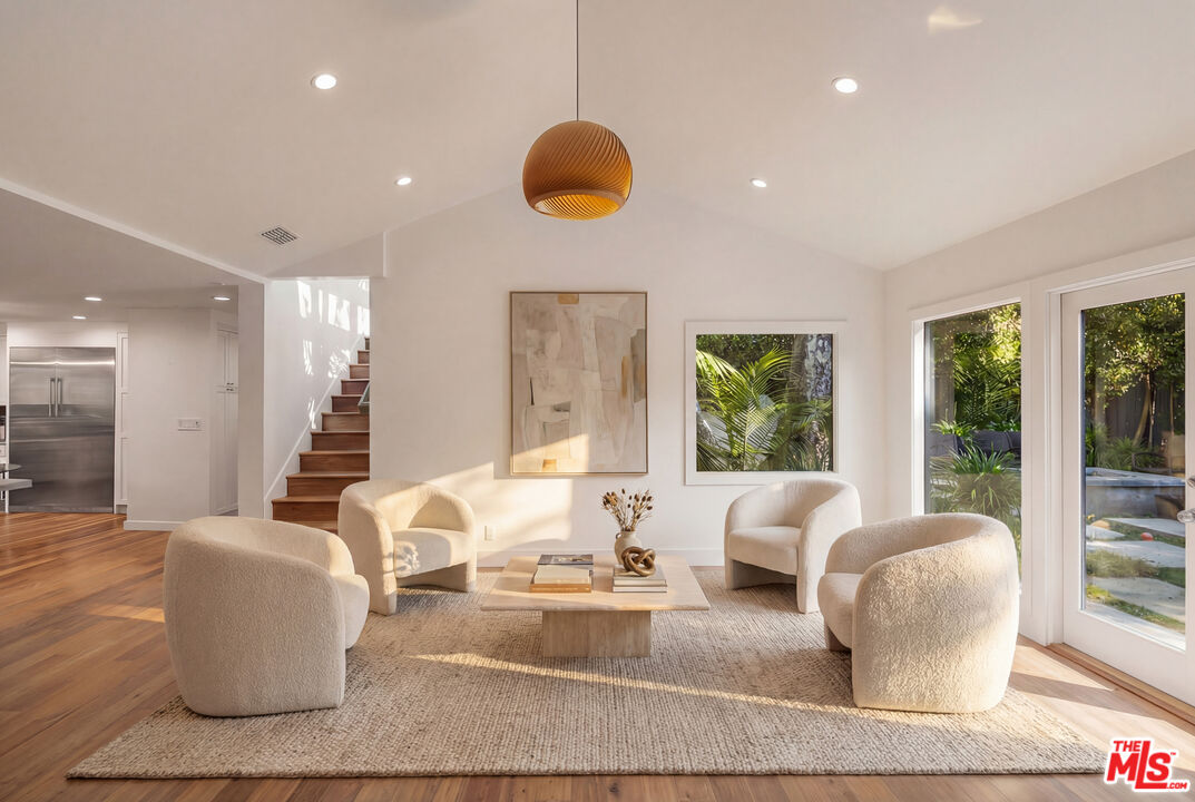 576 East Channel Road Santa Monica, CA 90402 - Photo 8 of 22 a living room with furniture and a large window