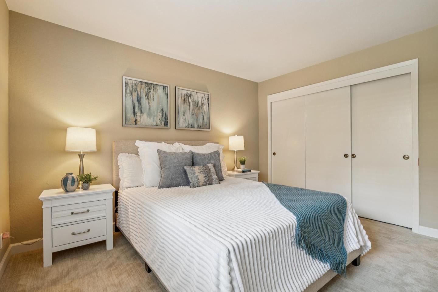 404 Ridge Gate Road Orinda, CA 94563 - Photo 11 of 27 a bedroom with a bed and a night stand