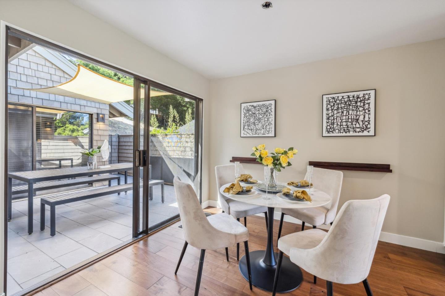404 Ridge Gate Road Orinda, CA 94563 - Photo 18 of 27 a view of a dining room with furniture wooden floor and a potted plant