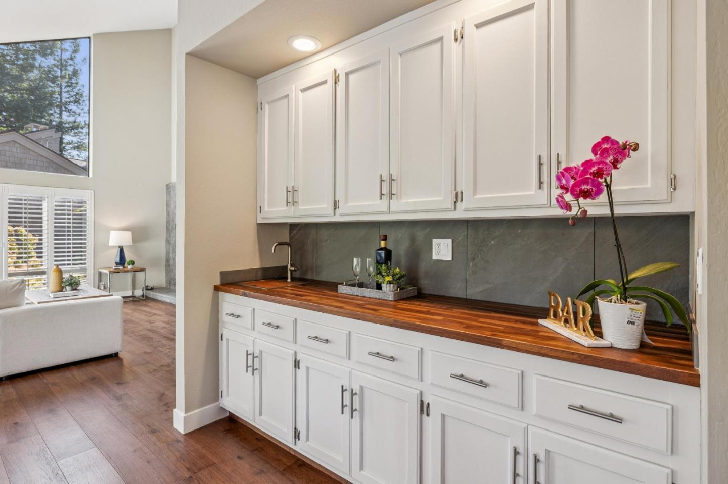 404 Ridge Gate Road Orinda, CA 94563 - Photo 21 of 27 a kitchen with granite countertop a sink and cabinets