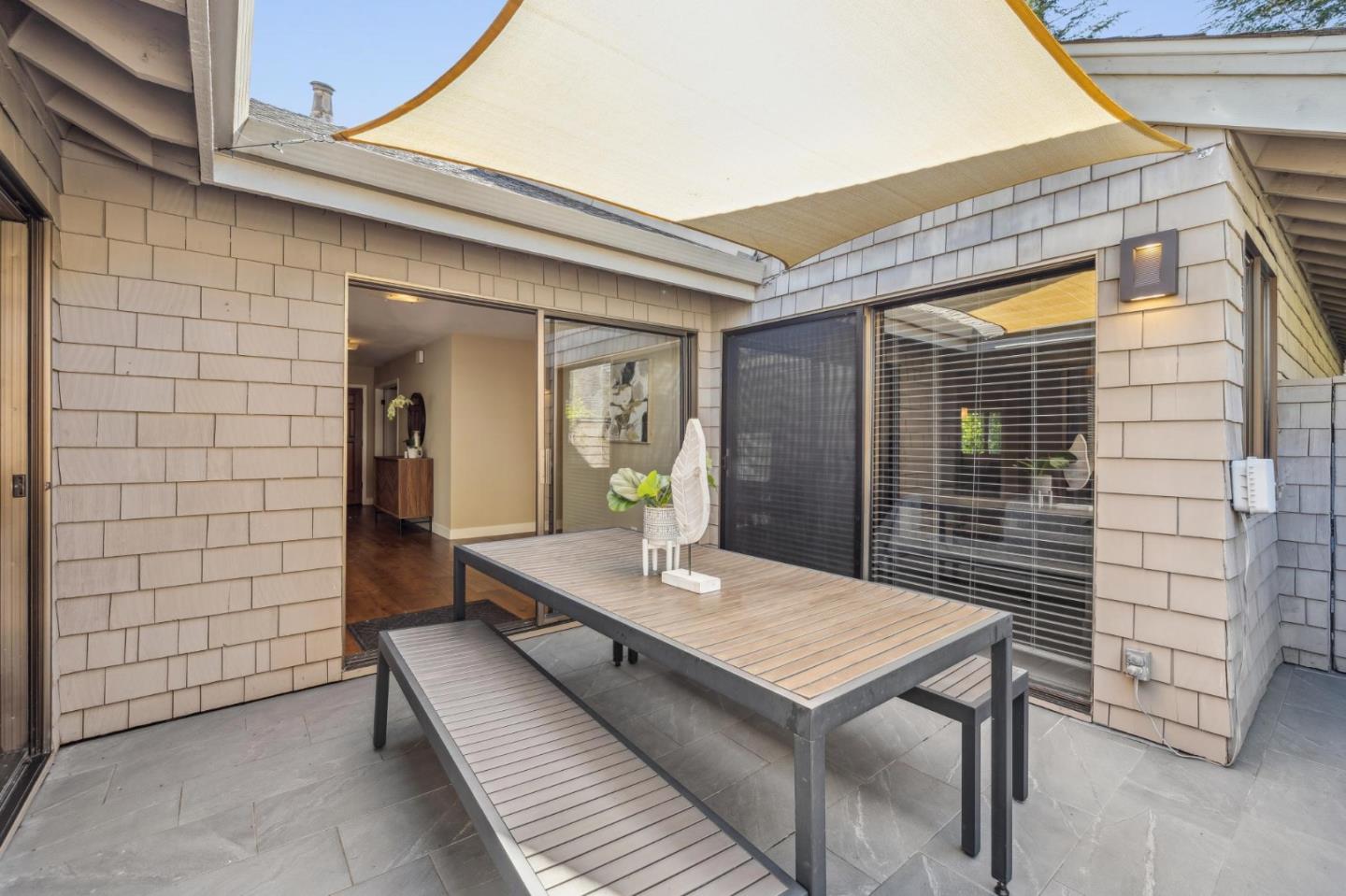 404 Ridge Gate Road Orinda, CA 94563 - Photo 22 of 27 a balcony with table and chairs