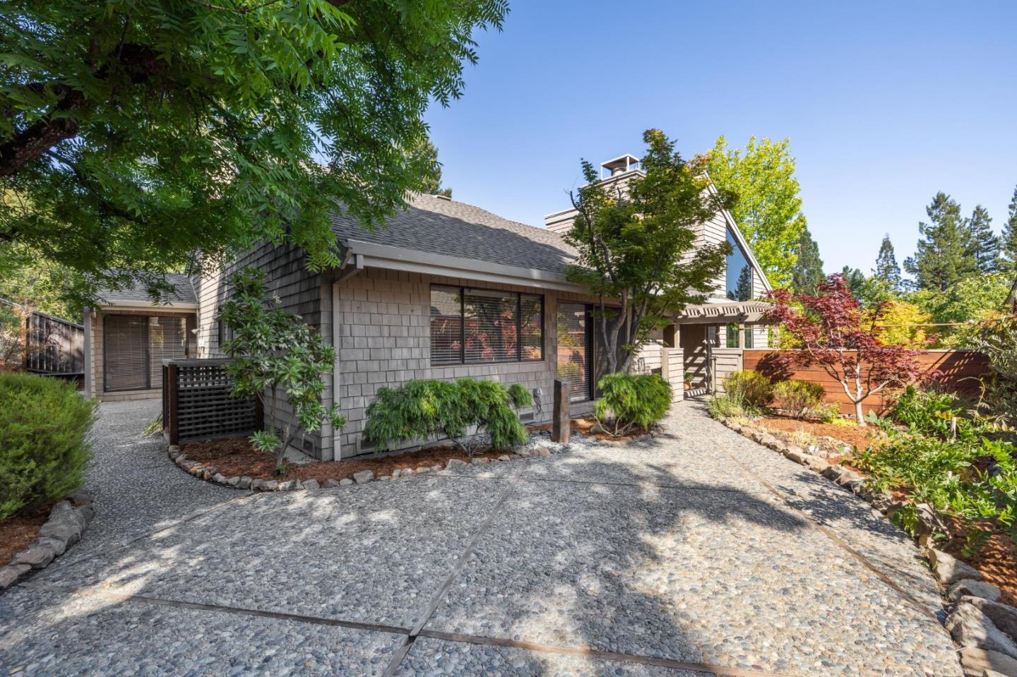 404 Ridge Gate Road Orinda, CA 94563 - Photo 25 of 27 a front view of a house with garden