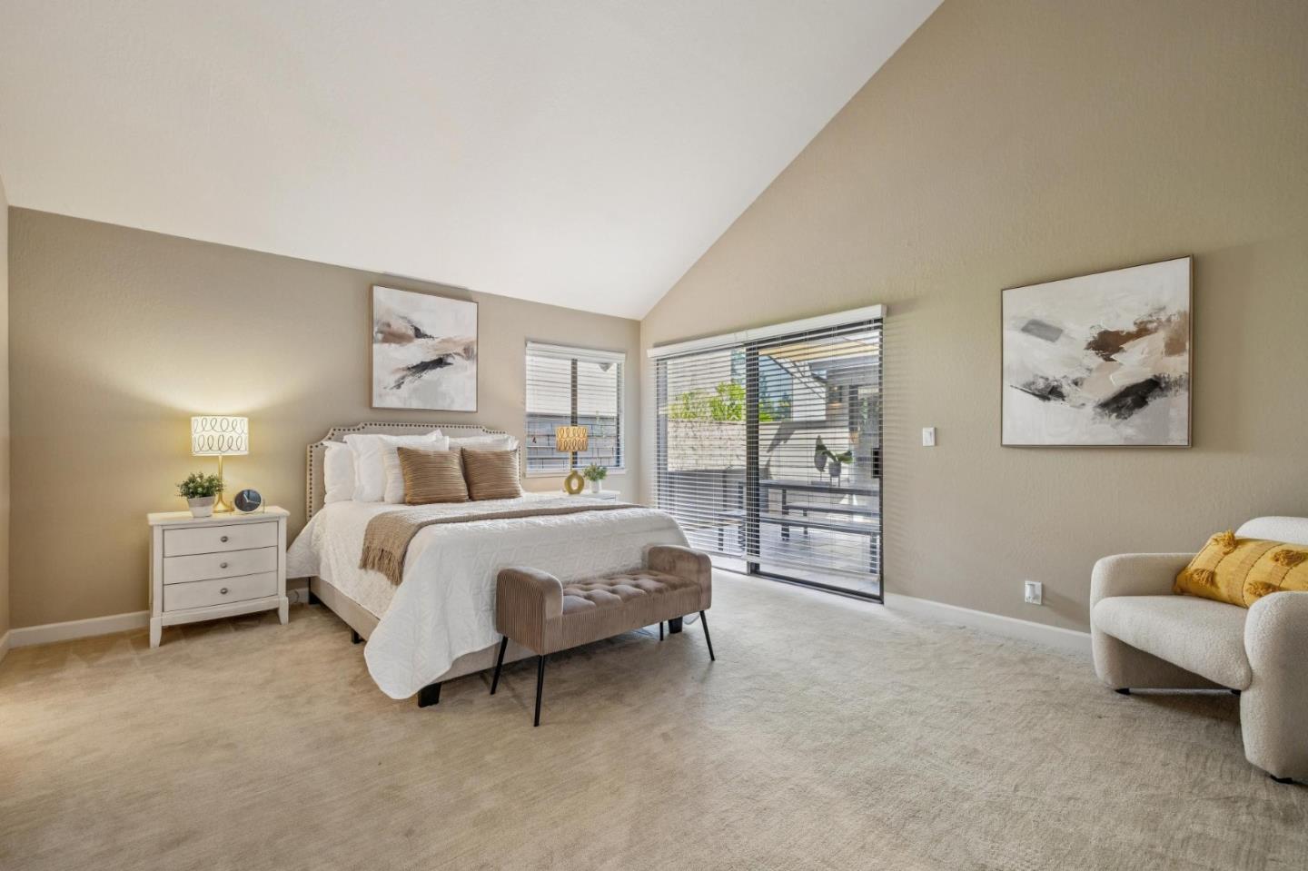 404 Ridge Gate Road Orinda, CA 94563 - Photo 7 of 27 a spacious bedroom with a bed and a couch