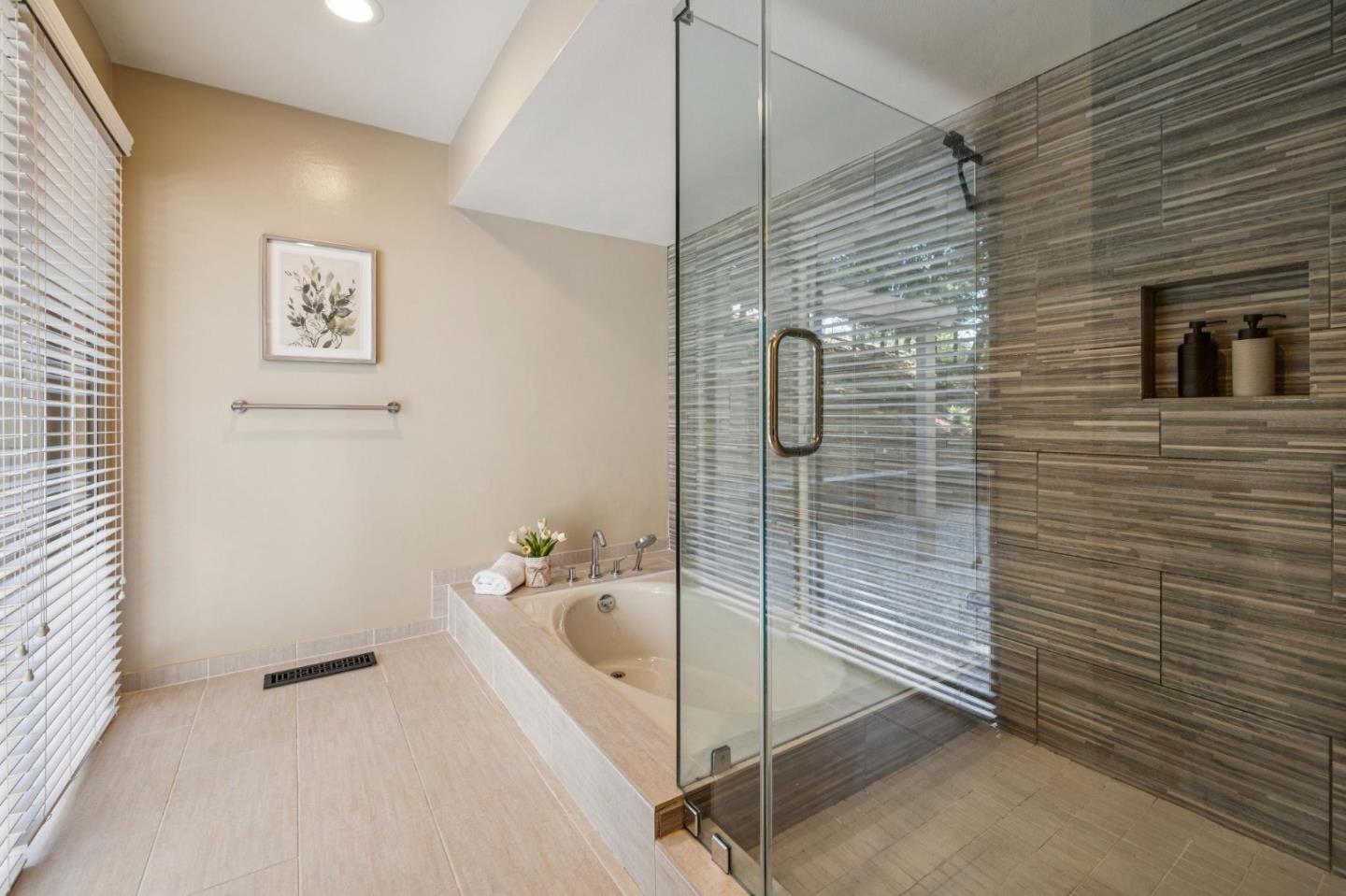 404 Ridge Gate Road Orinda, CA 94563 - Photo 10 of 27 a bathroom with a bathtub and shower