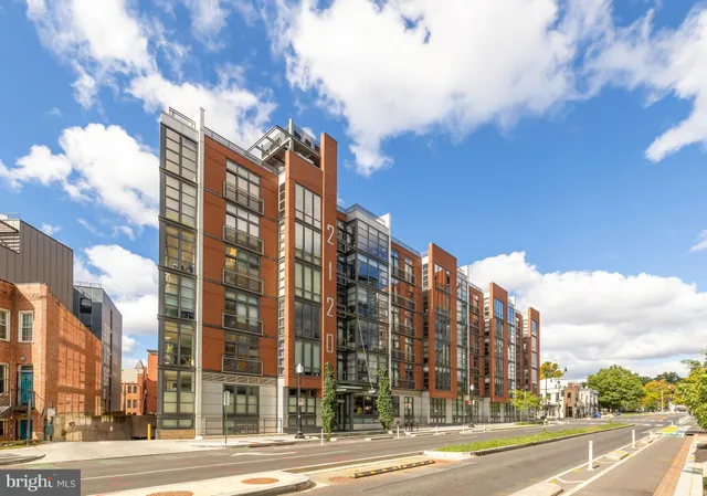 a city street lined with tall buildings