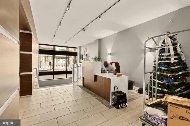 a room with gym equipment and a large window