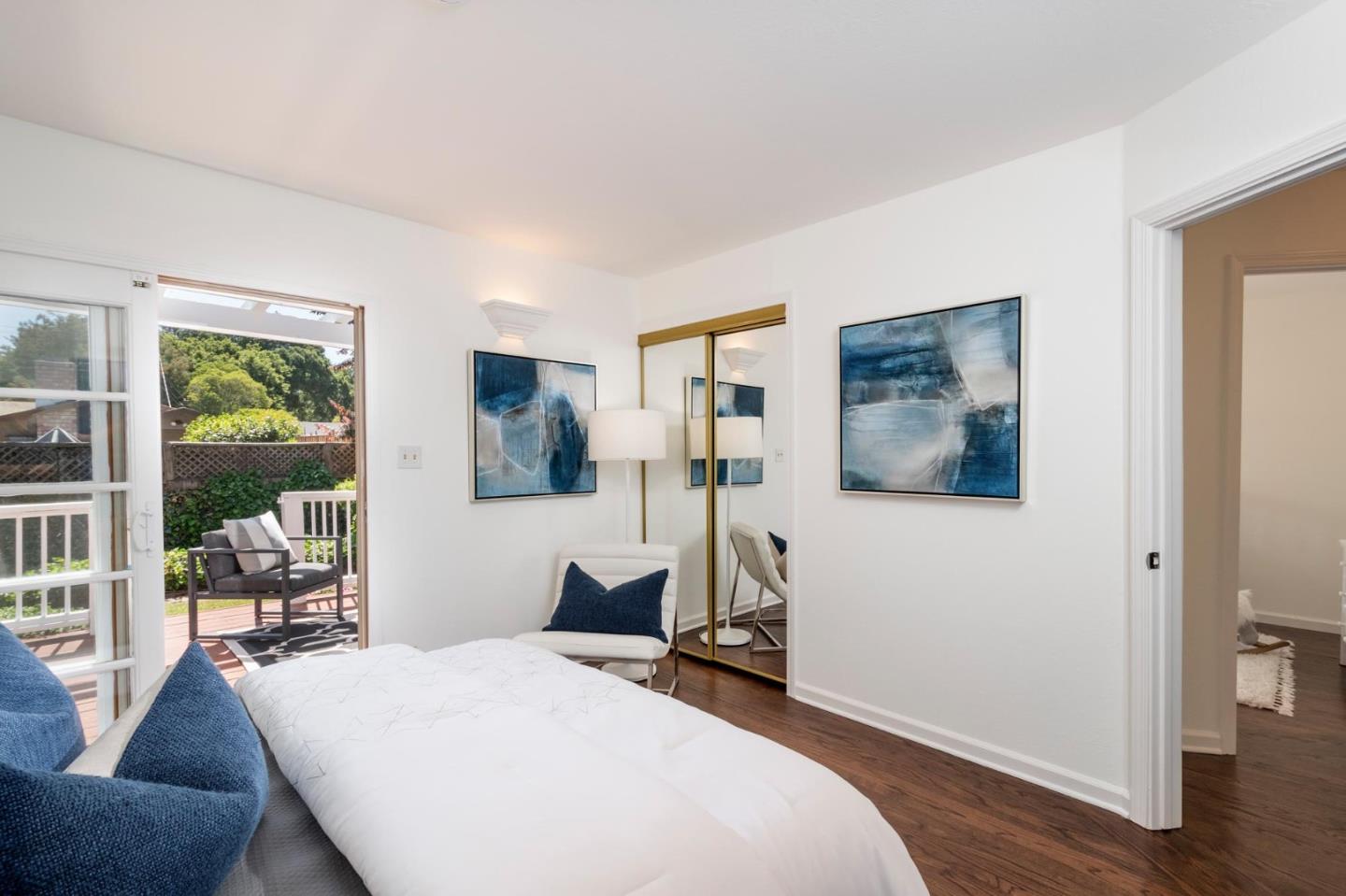 604 9th Avenue Menlo Park, CA 94025 - Photo 19 of 28 a bedroom with a bed and wooden floor