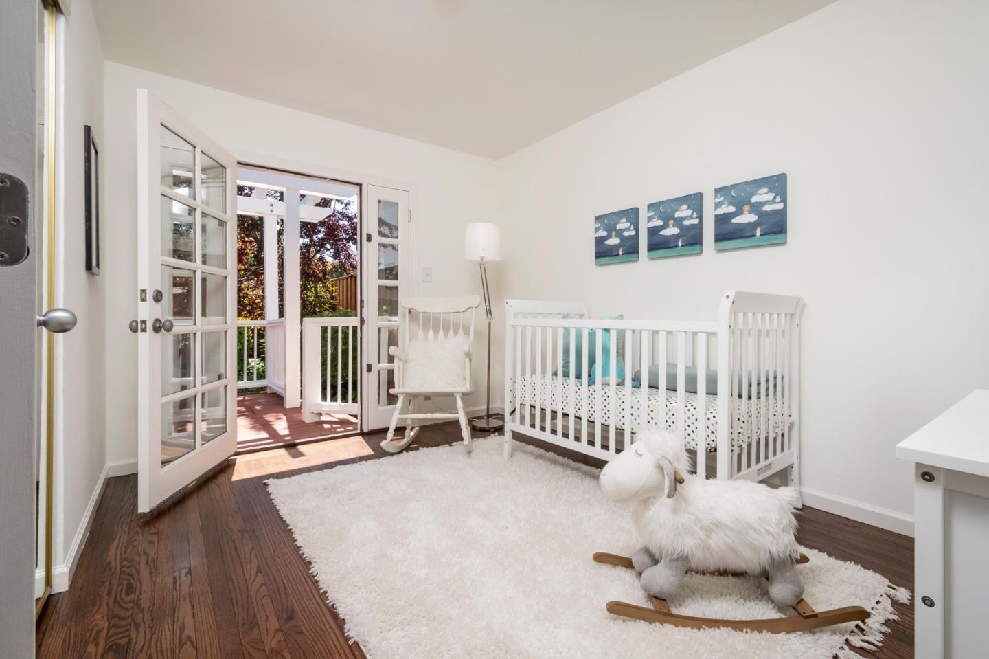 604 9th Avenue Menlo Park, CA 94025 - Photo 20 of 28 a bedroom with furniture and wooden floor