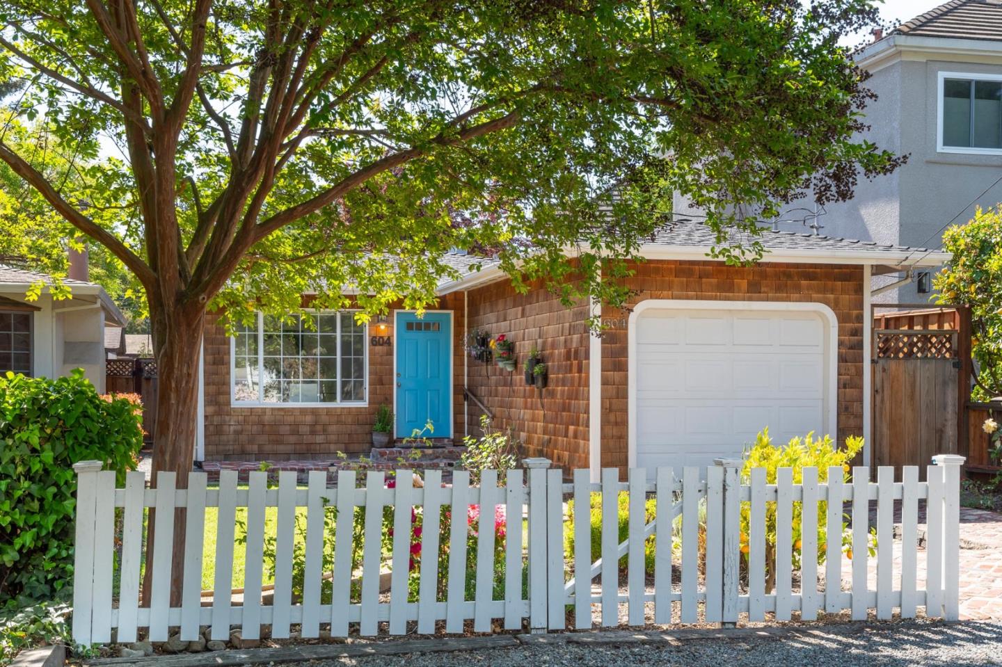 604 9th Avenue Menlo Park, CA 94025 - Photo 2 of 28 a front view of house with a garden