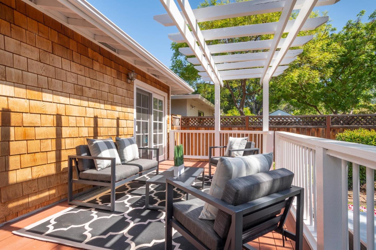 604 9th Avenue Menlo Park, CA 94025 - Photo 26 of 28 a balcony with furniture and a potted plant