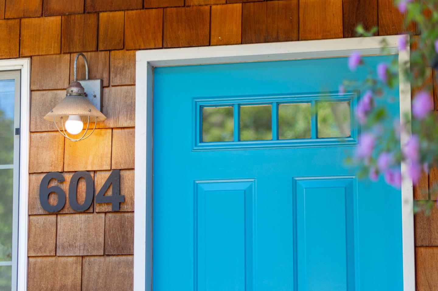 604 9th Avenue Menlo Park, CA 94025 - Photo 8 of 28 a front view of a house with a yellow gate