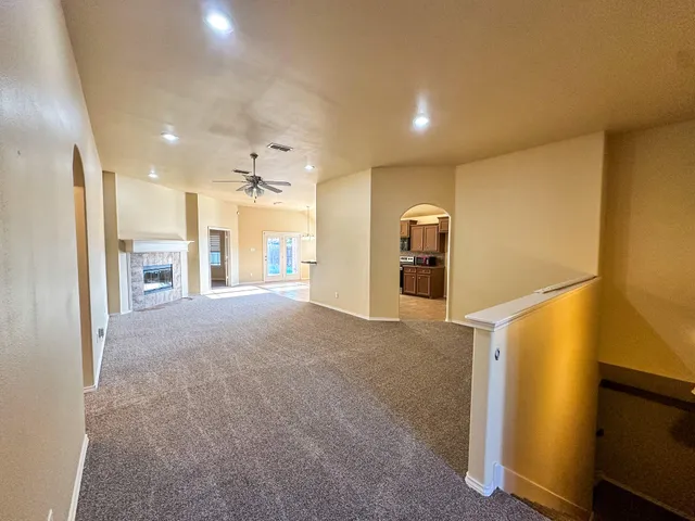 a view of a electric appliances in kitchen and a glass door