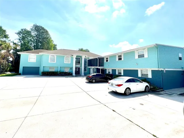 a car parked in front of a house