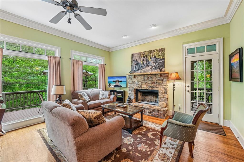 14 Laurel Ridge Lane Big Canoe, GA 30143 - Photo 10 of 72 a living room with furniture and a fireplace