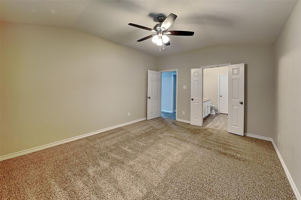 105 Independence Trail Forney, TX 75126 - Photo 8 of 18 an empty room with closet and windows