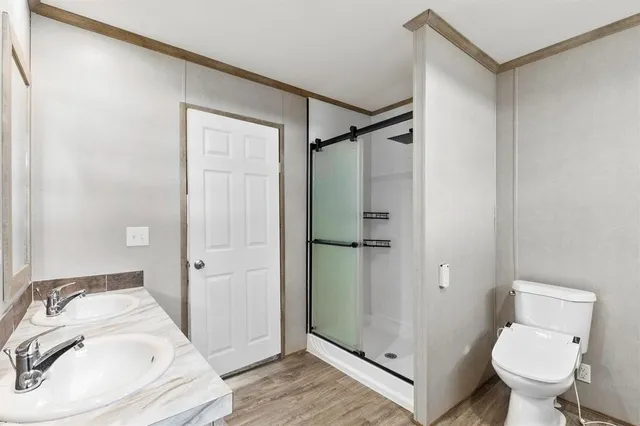 a bathroom with a sink and a toilet