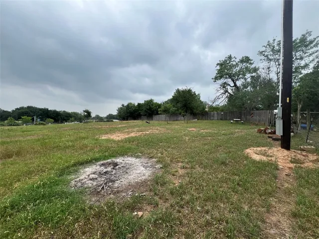 a view of a golf course with a lake