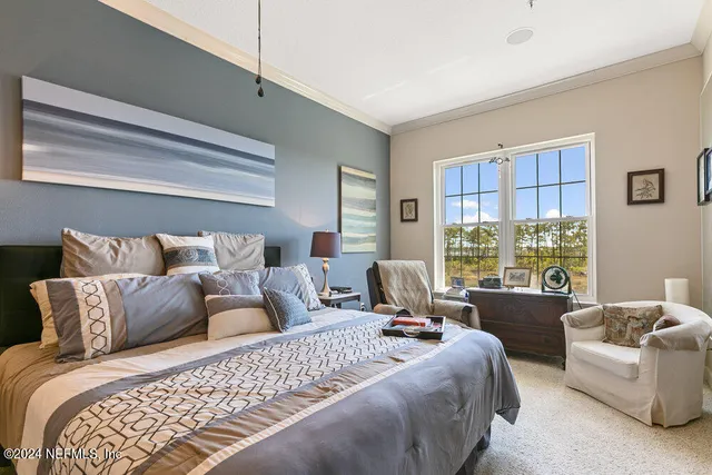 a bathroom with a bathtub sink and mirror