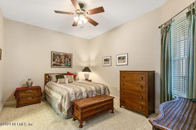 a bathroom with a sink toilet tub and shower