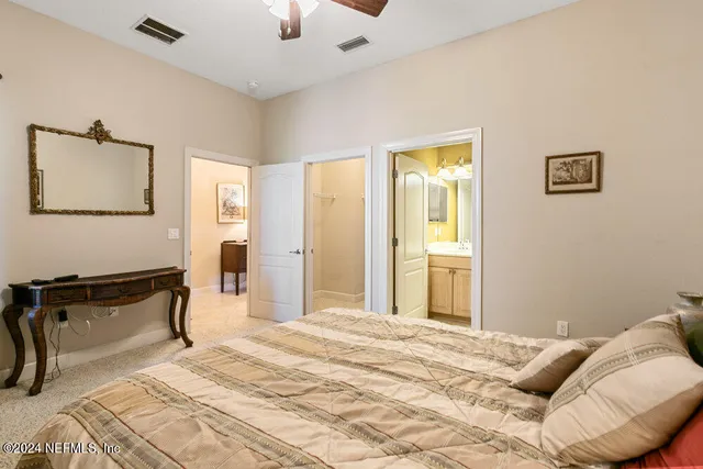 a bed room with furniture and a window