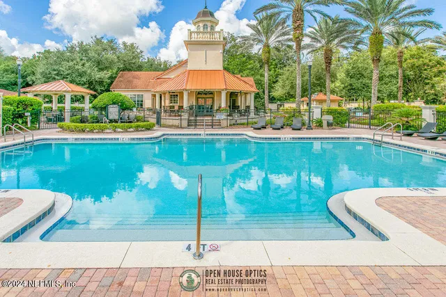 a view of a street with a building in the background