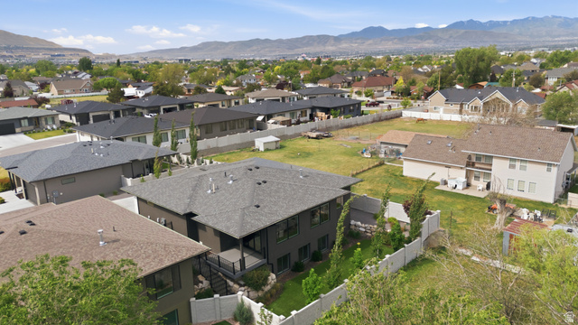 653 East Vandalay Lane Draper, UT 84020 - Photo 55 of 61 Modern architectural design featuring a multi-level exterior, dark gray siding, and a dark gray shingle roof