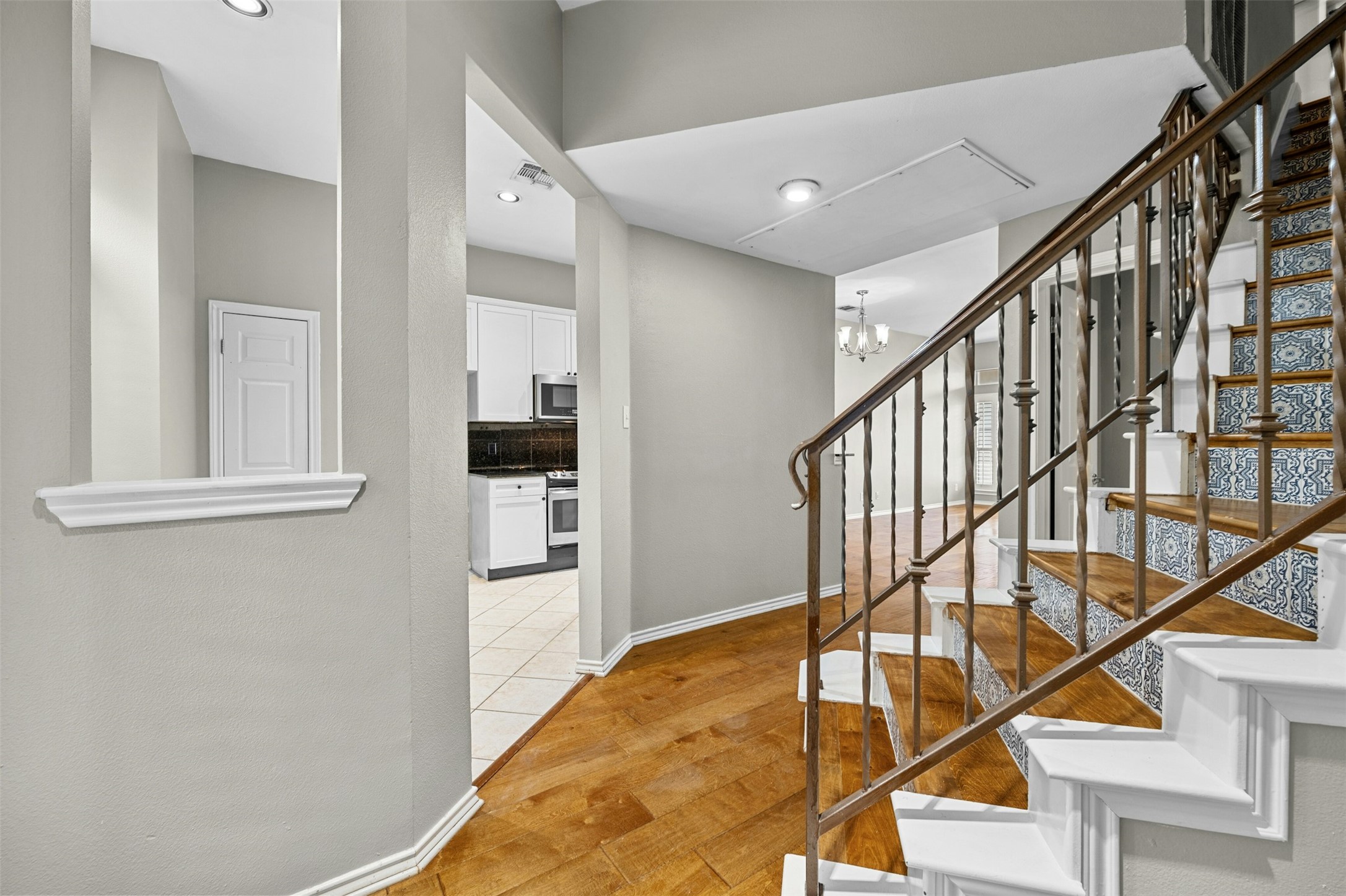 2918 Ranch To Market Road 620, Unit W219 Austin, TX 78734 - Photo 5 of 35 Bright and open entry flows into the kitchen and living spaces - notice the hardwood floors and thoughtful layout.