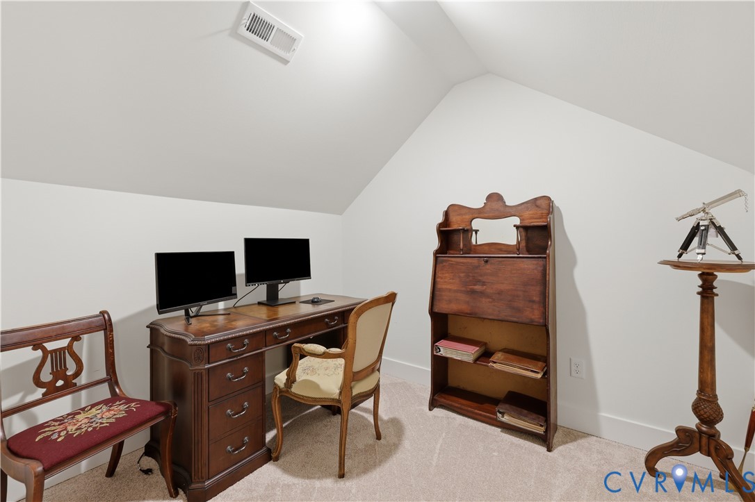 25181 West Soap Stone Road Jetersville, VA 23083 - Photo 32 of 54 Carpeted room with sloped ceilings and white walls