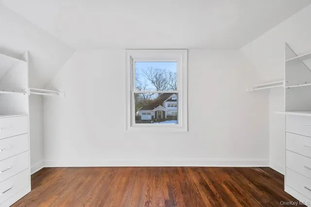 a bathroom with a shower and a toilet