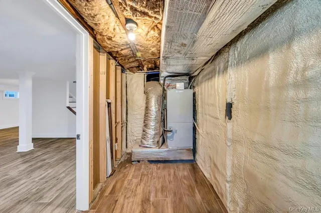 a view of an empty room with windows