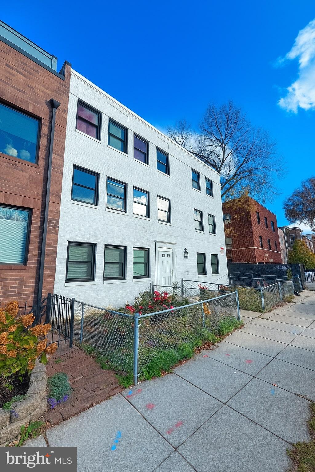 1635 6th Street Northwest, Unit 2 Washington, DC 20001 - Photo 6 of 14 a front view of a building with garden