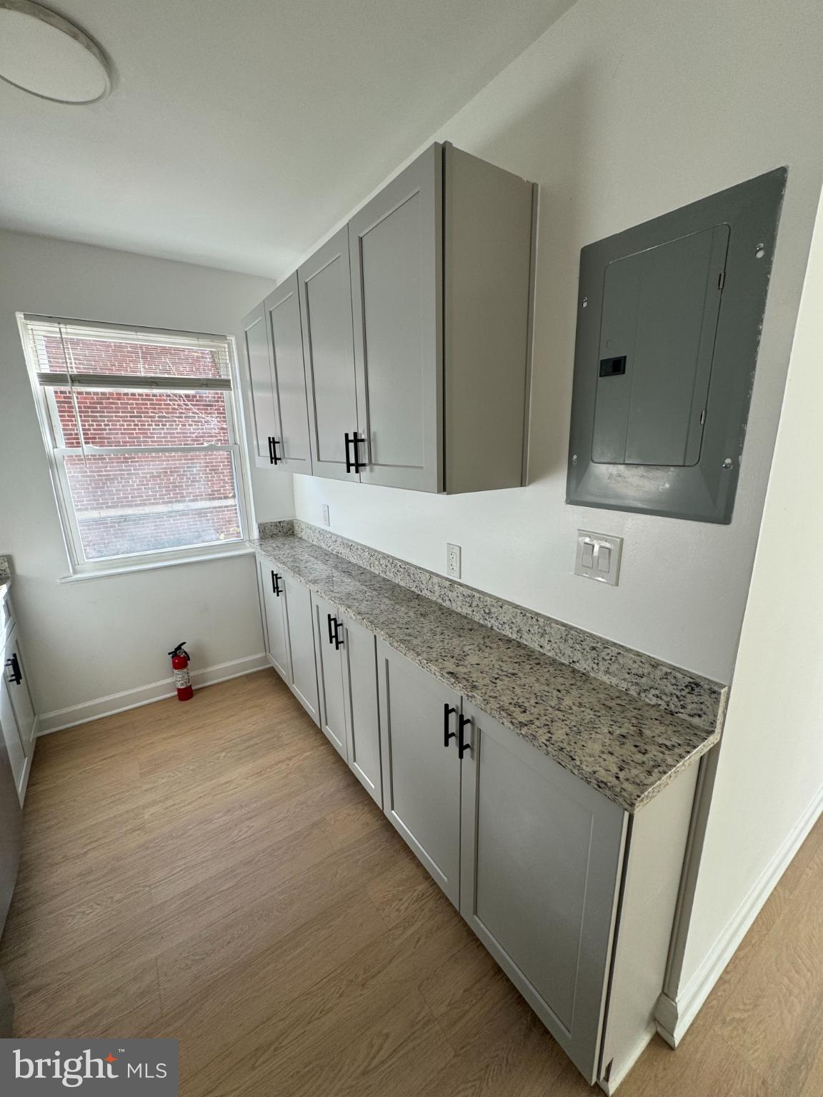 1635 6th Street Northwest, Unit 2 Washington, DC 20001 - Photo 10 of 14 a bathroom with a granite countertop sink and a mirror