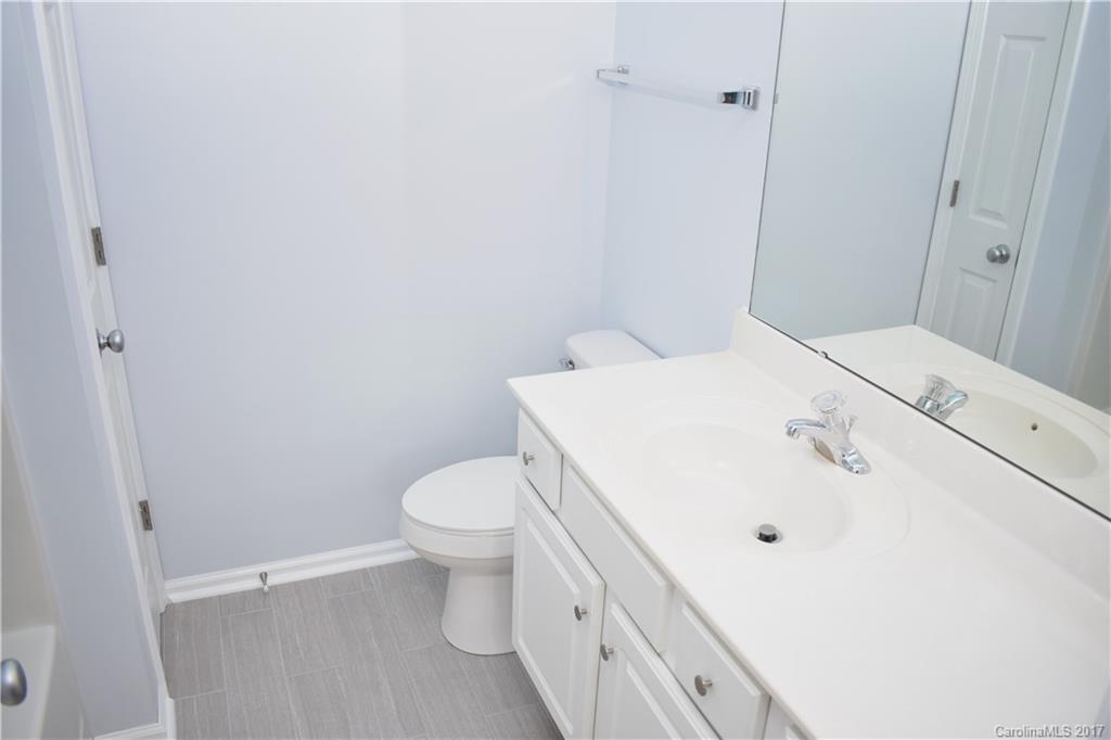 224 Dawn Mist Lane Fort Mill, SC 29708 - Photo 8 of 16 a bathroom with a sink and toilet