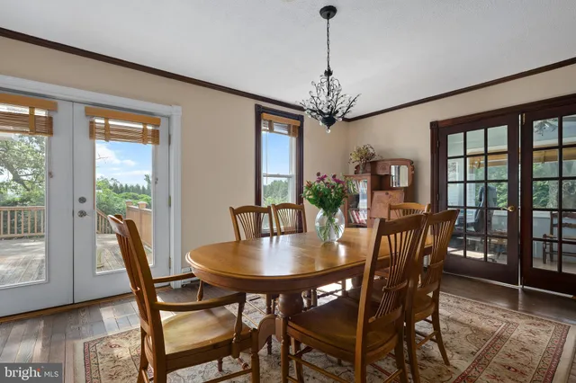 a bathroom with a sink toilet and a mirror