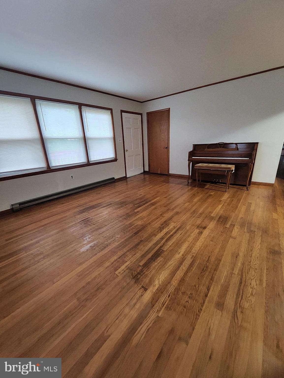 415 View Town Road Amissville, VA 20106 - Photo 2 of 19 a view of a livingroom with wooden floor