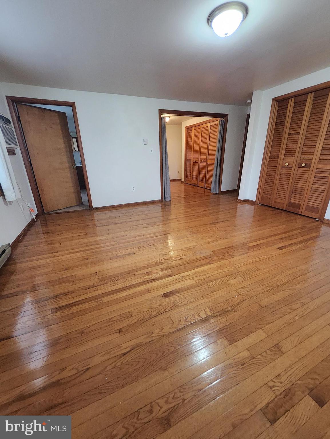 415 View Town Road Amissville, VA 20106 - Photo 9 of 19 a view of empty room with wooden floor