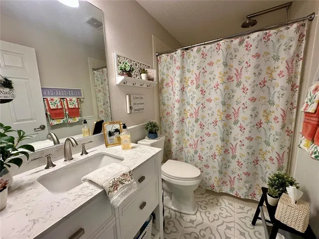 a living room with patio area and furniture