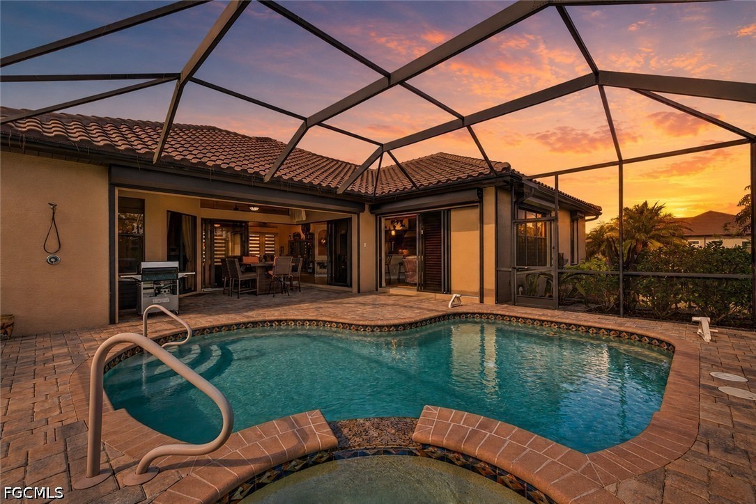 6109 Calusa Rdg Trail Bokeelia, FL 33922 - Photo 3 of 48 a view of a swimming pool with a patio