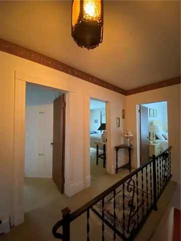 a view of a livingroom from a hallway