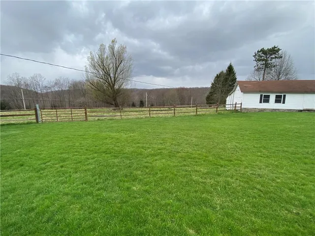 a view of a backyard of house