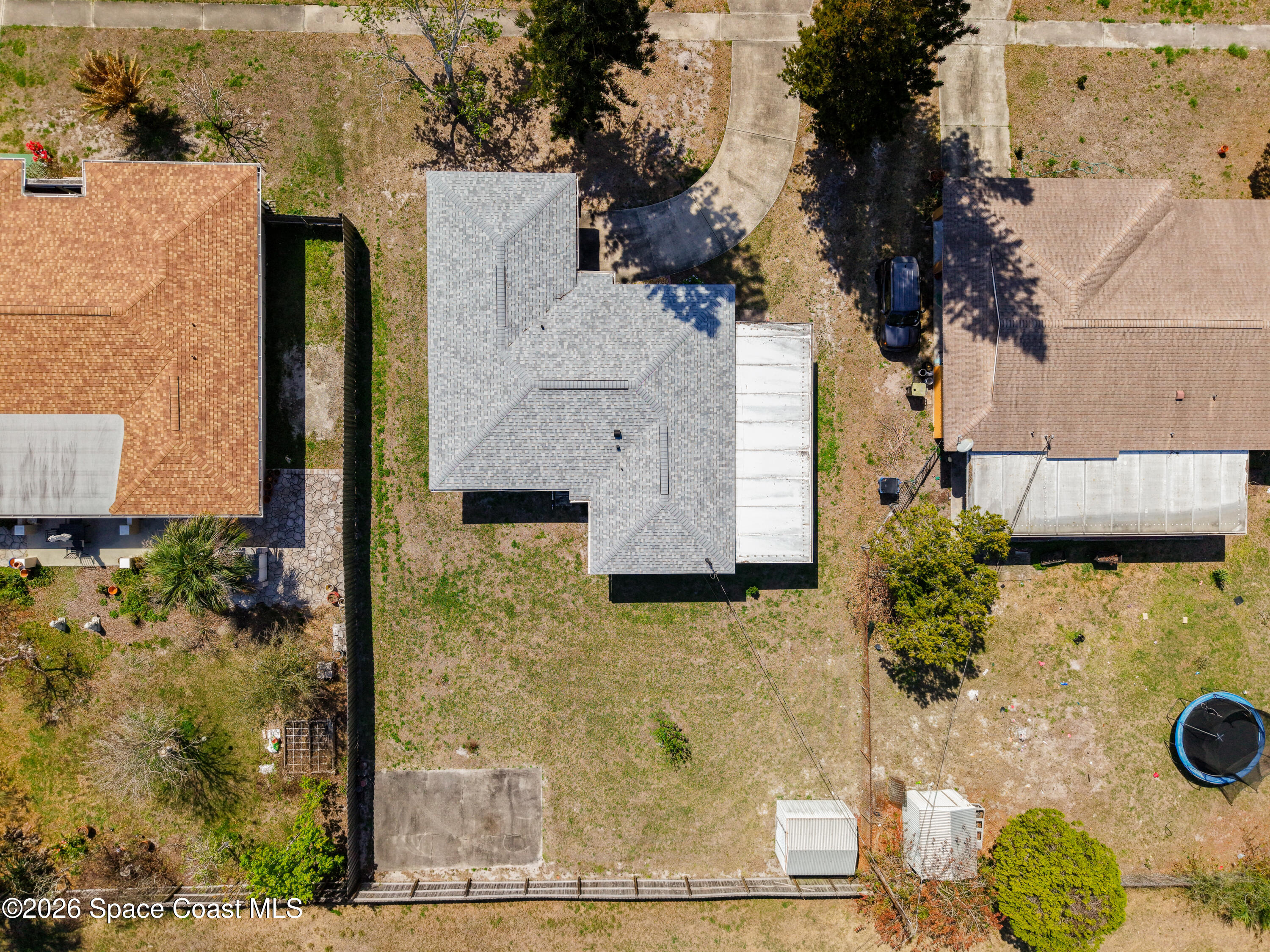 854 Angle Street Northeast Palm Bay, FL 32905 - Photo 23 of 23 aerial view of a house with a yard