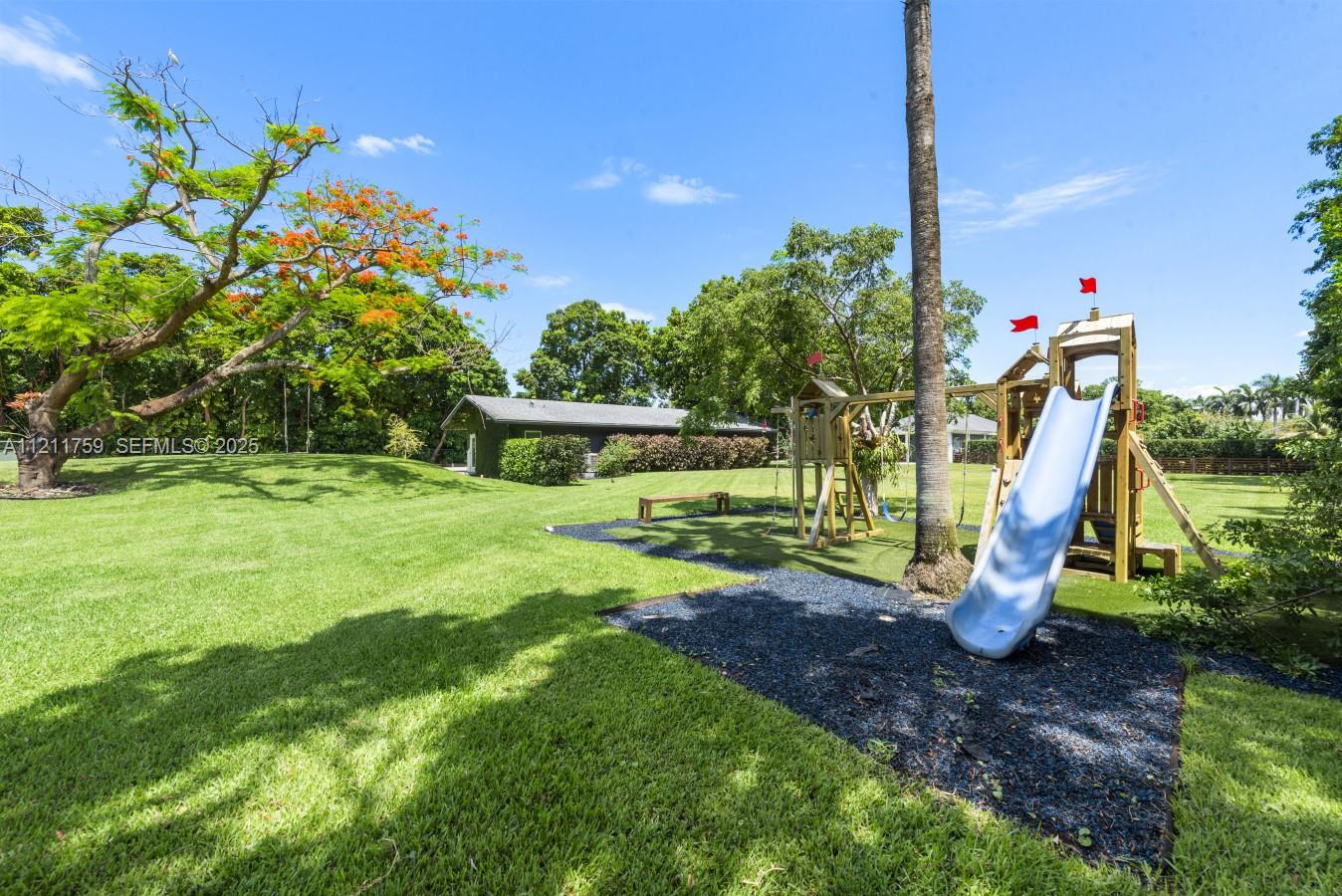 14305 Stirling Road Southwest Ranches, FL 33330 - Photo 65 of 66 a view of a park with slide
