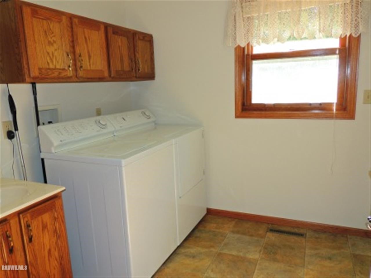 10730 East Rock Grove Road Davis, IL 61019 - Photo 11 of 12 a utility room with a window