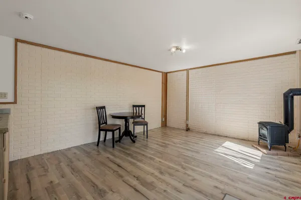 a view of a livingroom with furniture