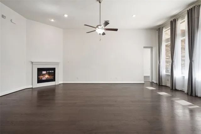 a bathroom with a bathtub sink and mirror